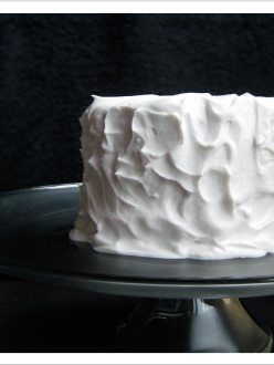 Lemon Olive Oil Layer Cake with Coconut Whipped Cream Frosting