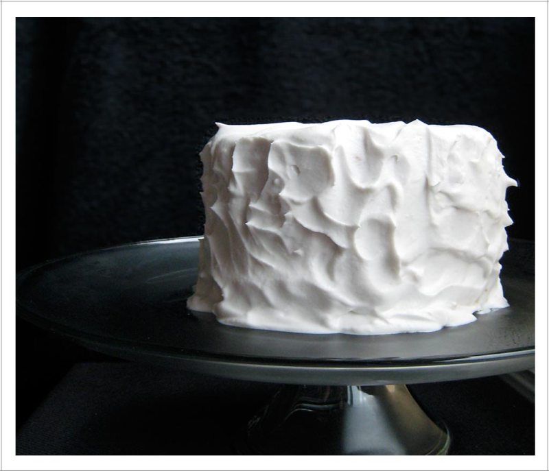 Lemon Olive Oil Layer Cake with Coconut Whipped Cream Frosting